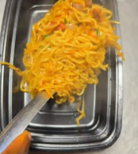 Stir-fried noodles in a tray